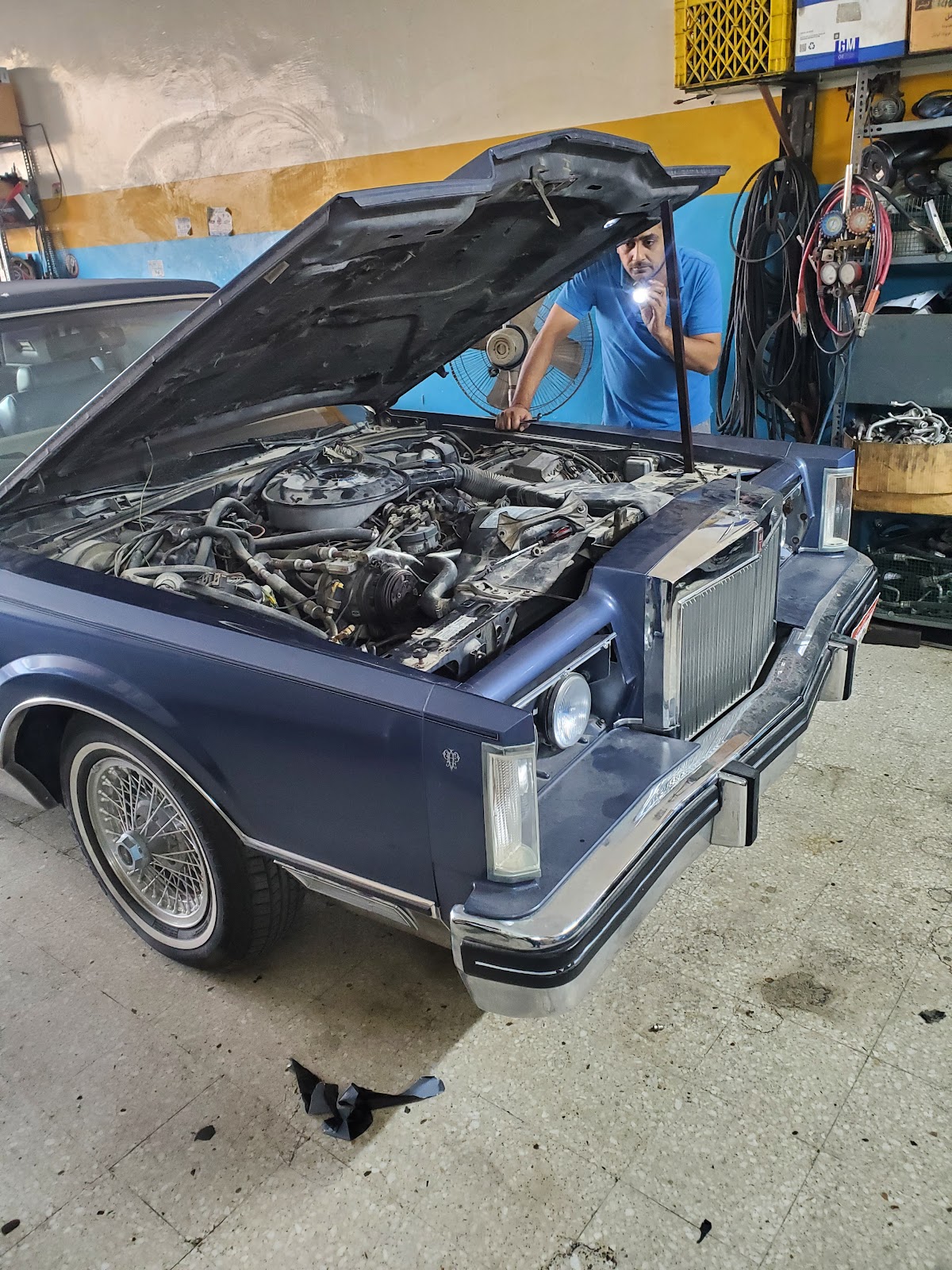 Car battery & car mechanic photo