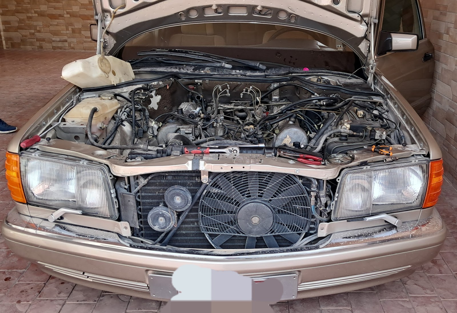 Car battery & car mechanic photo