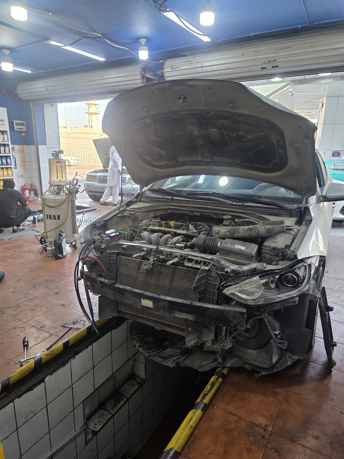 Car repair / mechanic oil change photo