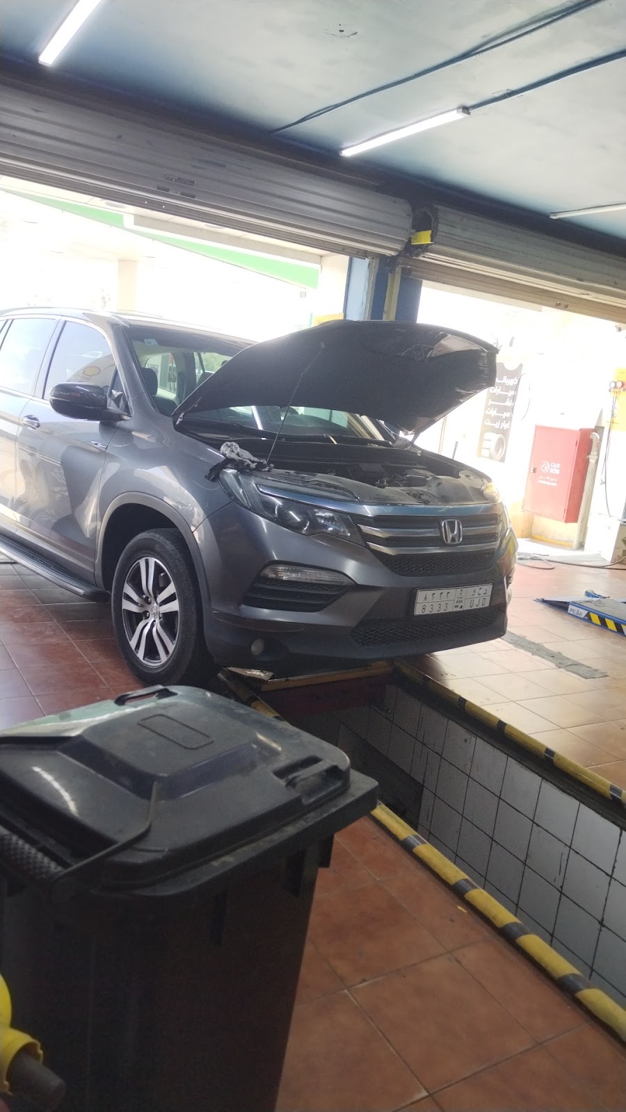 Car repair / mechanic oil change photo